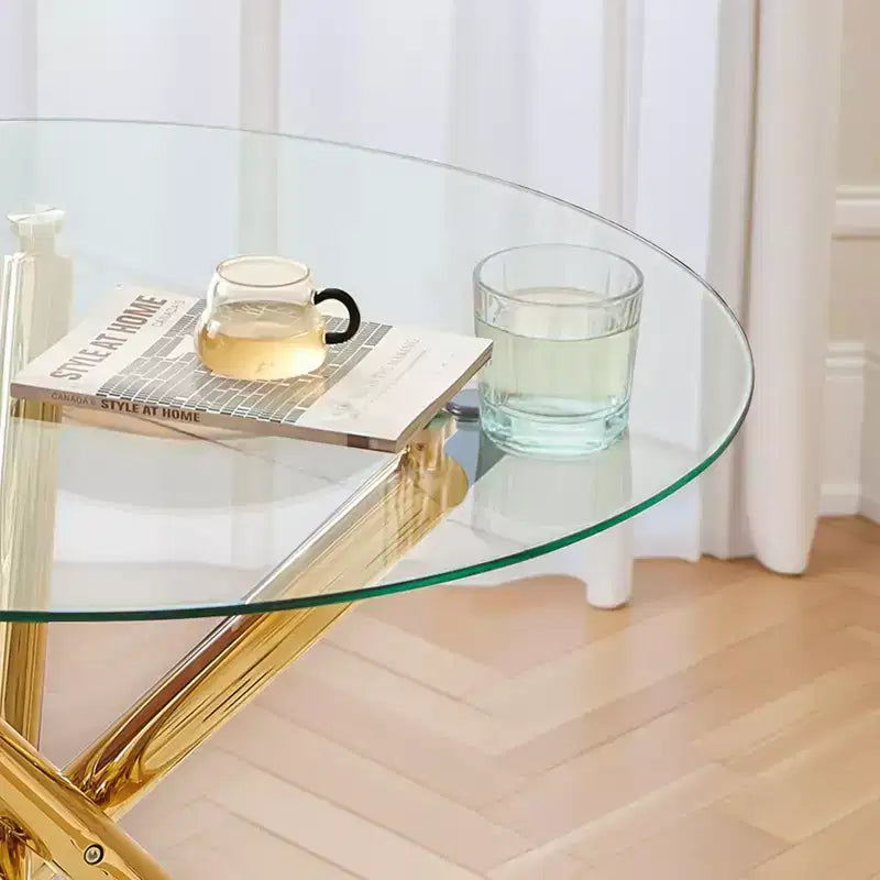 Table à manger en verre avec pieds métalliques croisés - Économiseur d'espace moderne
