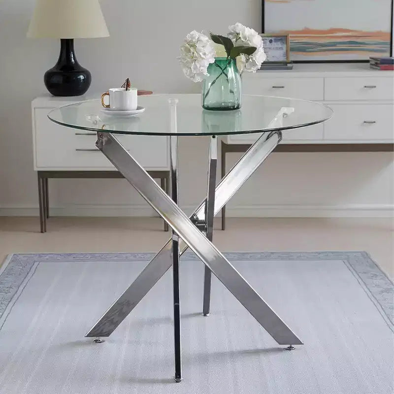Table à manger en verre avec pieds métalliques croisés - Économiseur d'espace moderne