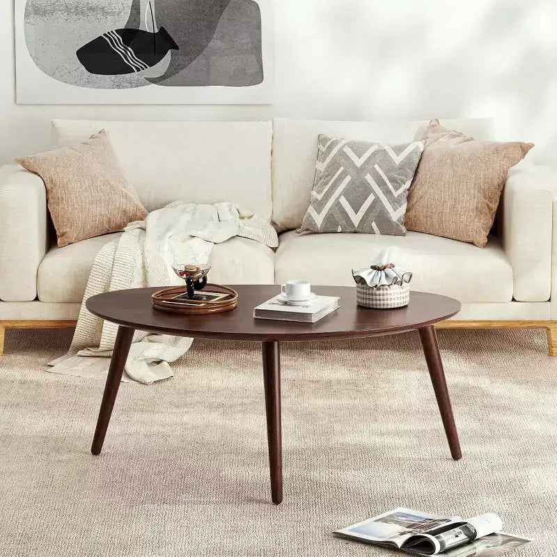 GDFStudio Adolph Table Basse Ovale Mid-Century Moderne 33.46 L en Bois de Chêne Massif à Trois Pieds