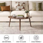 GDFStudio Adolph Table Basse Ovale Mid-Century Moderne 33.46 L en Bois de Chêne Massif à Trois Pieds