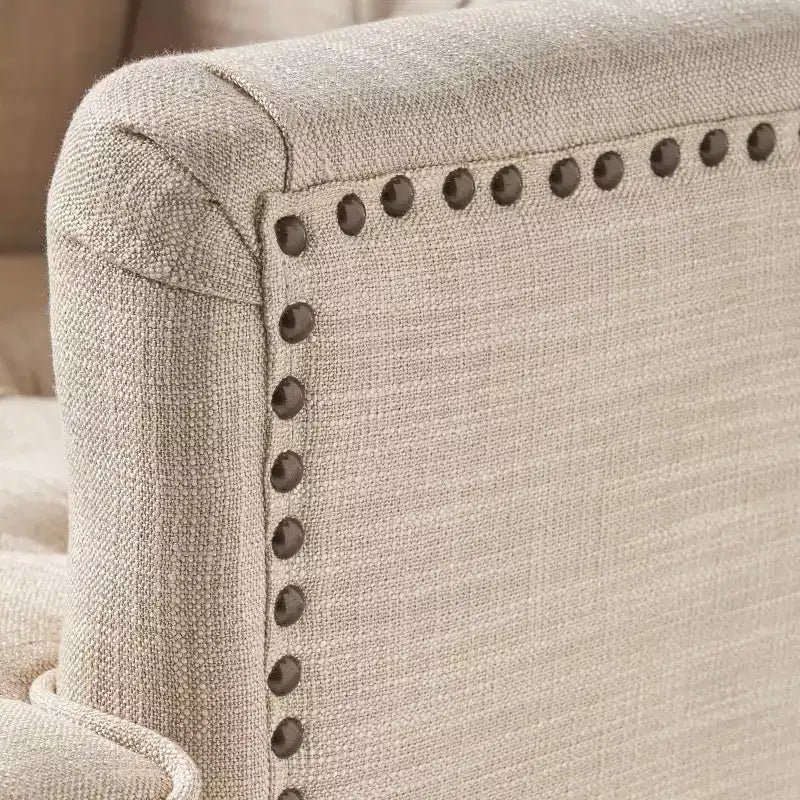 Fauteuil de club contemporain capitonné GDFStudio Aurelia avec clous décoratifs