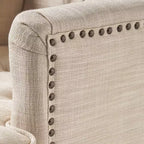 Fauteuil de club contemporain capitonné GDFStudio Aurelia avec clous décoratifs