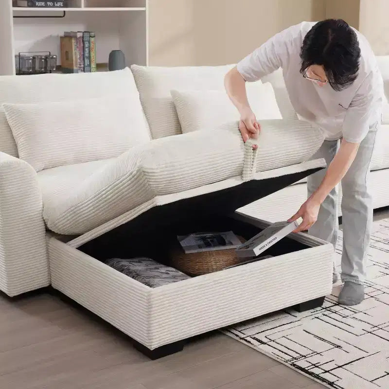Canapé d'angle confortable en velours côtelé avec oreillers et accoudoirs ronds, canapé-lit moderne profond avec pouf de rangement