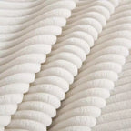 Canapé d'angle confortable en velours côtelé avec oreillers et accoudoirs ronds, canapé-lit moderne profond avec pouf de rangement