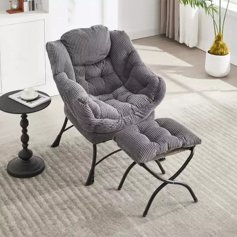 Fauteuil de salon moderne Zeus et Ruta rembourré avec accoudoirs, poche latérale et pouf assorti
