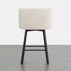 Tabouret de comptoir pivotant Spruce&Spring avec dossier incurvé, assise double épaisseur et piètement en métal