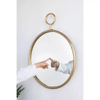 Miroir mural rond de 26 x 32 pouces avec cadre en métal doré