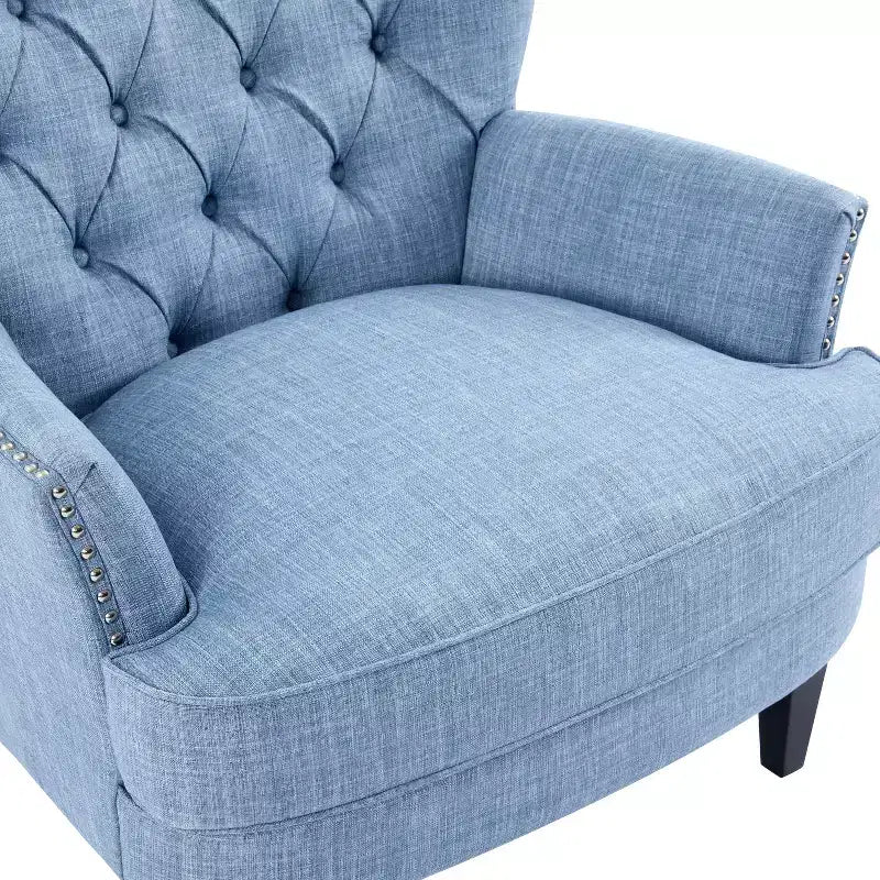 Fauteuil de relaxation touffeté Polibi avec dossier incurvé et clous décoratifs