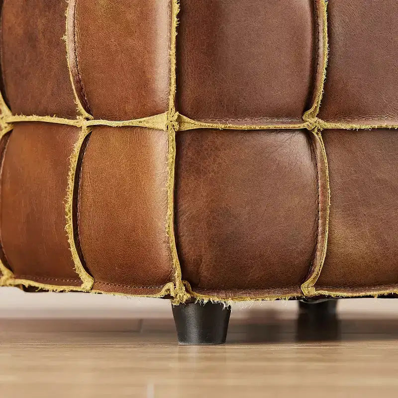 Ottoman en cuir cubique avec motif patchwork quadrillé