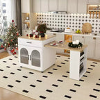 Îlot de cuisine avec table à manger, comptoir effet grain de bois avec prise de courant, desserte de rangement mobile avec armoire et 2 tiroirs, table de préparation de cuisine