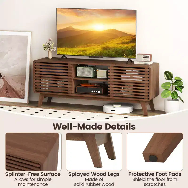 Meuble TV Costway avec portes coulissantes, étagères réglables et pieds en bois d'hévéa, pour téléviseurs jusqu'à 65 pouces
