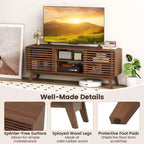 Meuble TV Costway avec portes coulissantes, étagères réglables et pieds en bois d'hévéa, pour téléviseurs jusqu'à 65 pouces