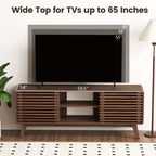 Meuble TV Costway avec portes coulissantes, étagères réglables et pieds en bois d'hévéa, pour téléviseurs jusqu'à 65 pouces