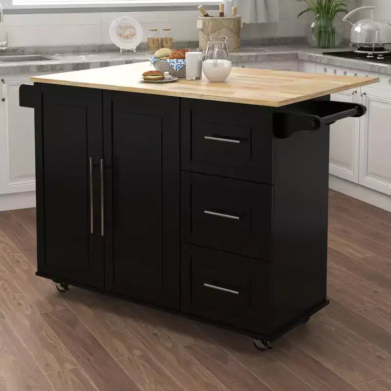 JVNOXK Îlot de cuisine avec range-épices, porte-serviettes et plateau extensible en bois massif, roulettes verrouillables et espace de rangement, noir