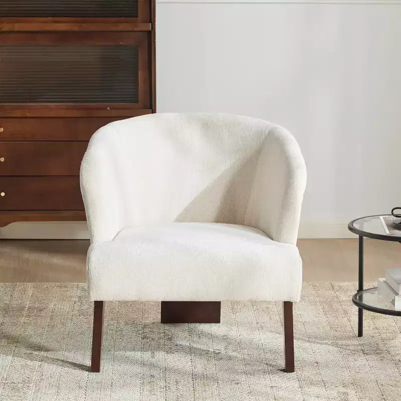 Fauteuil moderne avec dossier rond et pieds en bois, d'inspiration Mid-Century, pour salon