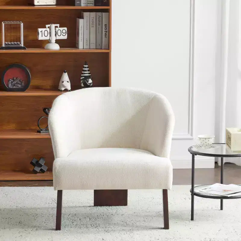 Fauteuil moderne avec dossier rond et pieds en bois, d'inspiration Mid-Century, pour salon
