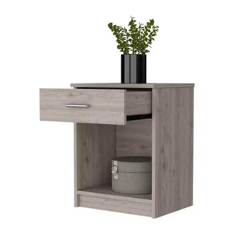 Conçue pour un usage quotidien, cette table de chevet Pictor avec un tiroir, une étagère inférieure et un plateau supérieur offre un look moderne et un rangement fonctionnel.