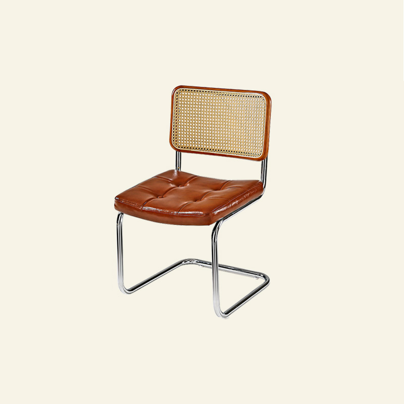 Chaise de salle à manger moderne en similicuir marron avec dossier tissé et piètement cantilever
