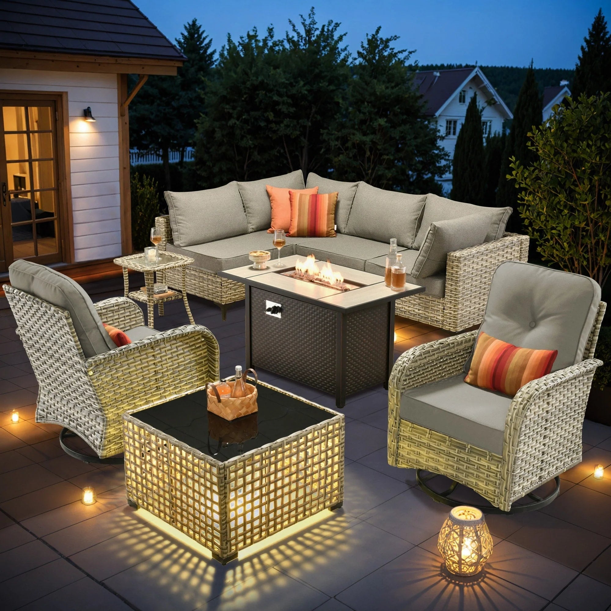 Ensemble de 9 chaises pivotantes en osier d'extérieur OVIOS avec table brasero