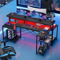 Bureau de gamer Bestier 71,5 pouces avec prise de courant, bureau d'ordinateur en L avec support d'écran, table de gamer d'angle avec étagère réglable et crochet pour casque