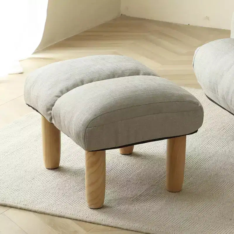 Fauteuil GDFStudio Sorrel moderne pivotant à 360° en lin avec dossier réglable et pouf
