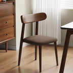 Chaise de salle à manger moderne sans accoudoirs en cuir à dossier bas