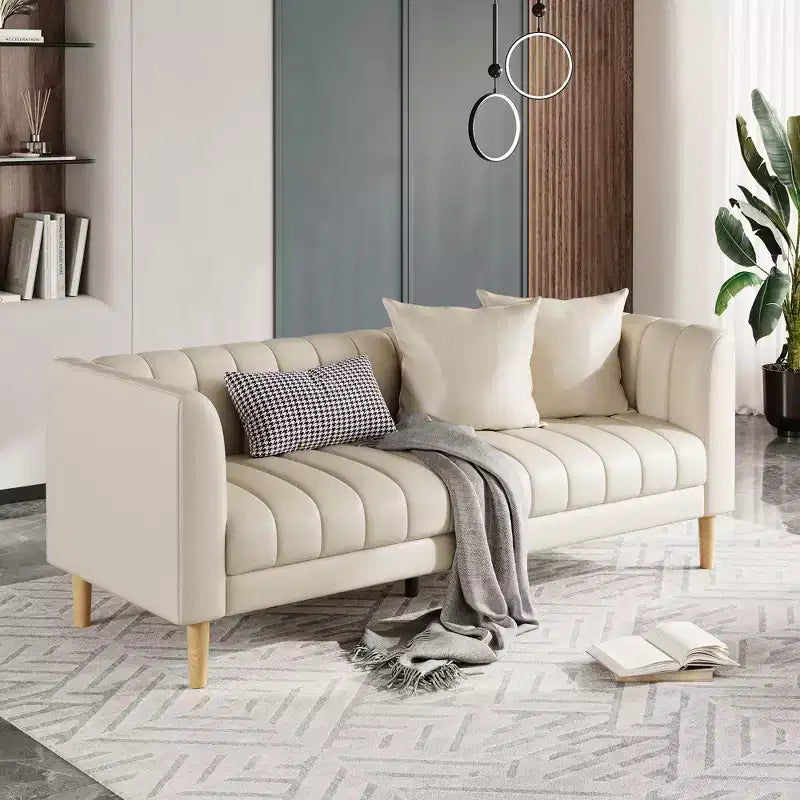 Canapé moderne en similicuir 83, 3 places avec assise profonde et pieds en bois, coussins ergonomiques et 2 coussins décoratifs pour salon, chambre ou appartement