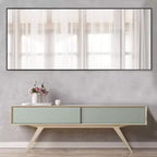 Miroir mural décoratif rectangulaire Dovelina à cadre métallique moderne