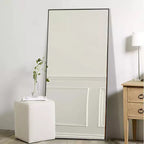 Miroir mural décoratif rectangulaire Dovelina à cadre métallique moderne