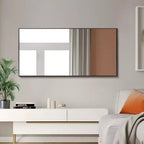 Miroir mural décoratif rectangulaire Dovelina à cadre métallique moderne