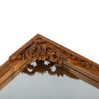 Miroir sur pied en bois massif sculpté en plein cintre