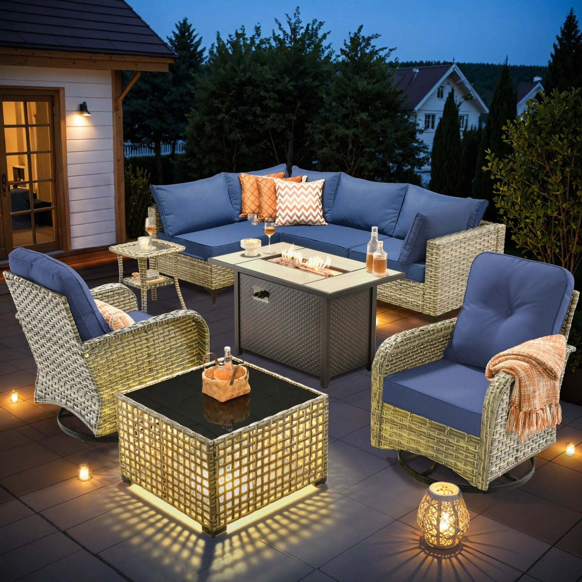 Ensemble de 9 chaises pivotantes en osier d'extérieur OVIOS avec table brasero