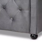 Lit de repos en tissu velours avec capitonnage à boutons