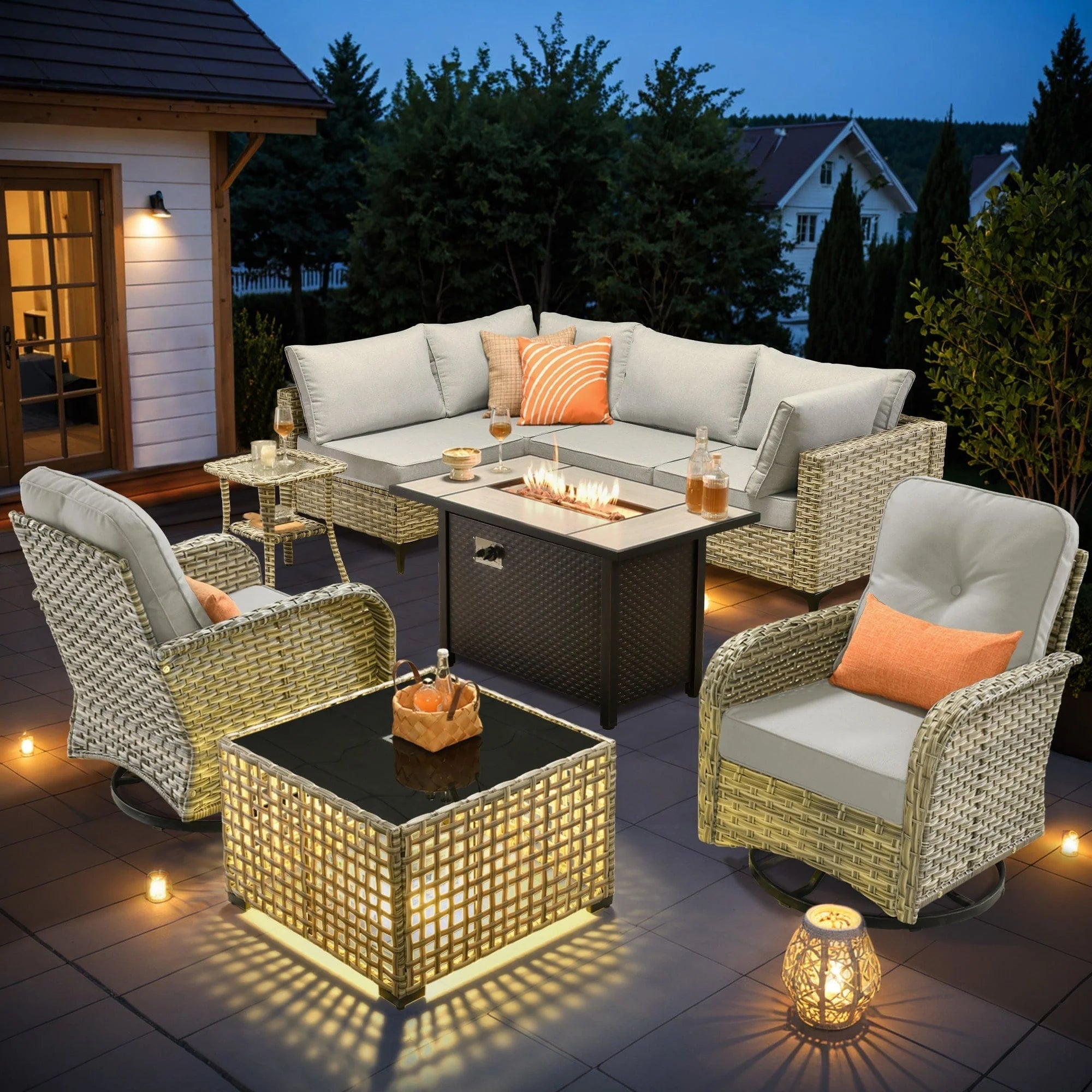 Ensemble de 9 chaises pivotantes en osier d'extérieur OVIOS avec table brasero